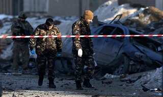 Two Afghan policemen killed as Kabul hit by bomb blasts