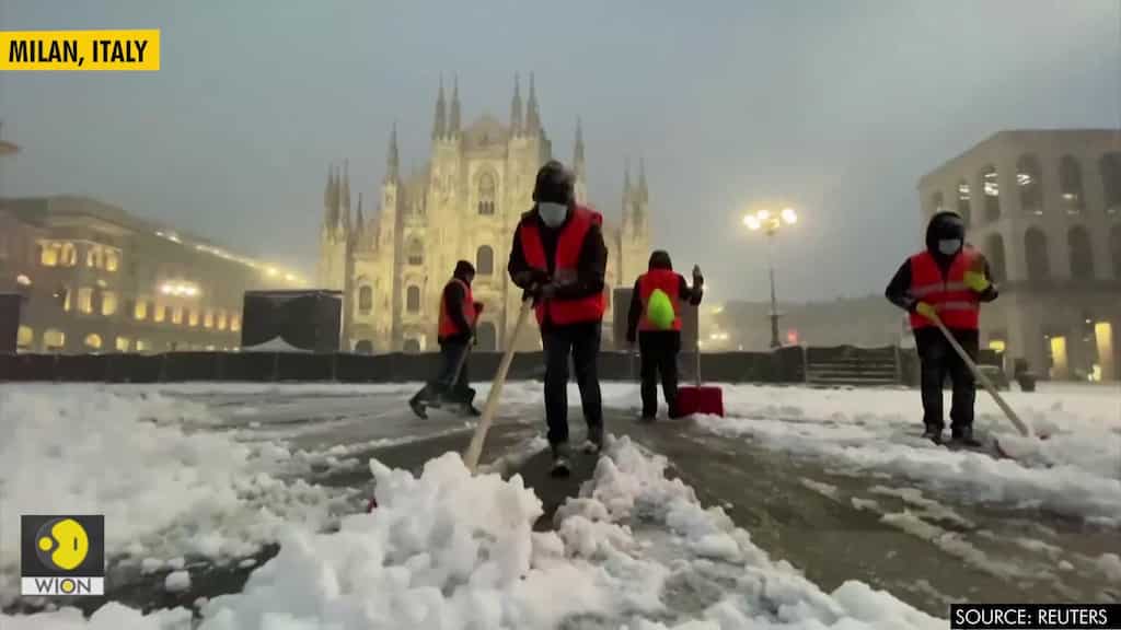Heavy snowfall blankets the city of Milan