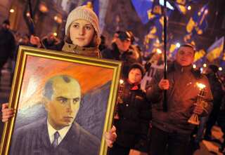 Activists march through Kyiv to honour controversial Ukrainian independence leader