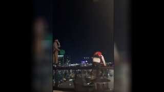 Watch | Men in parachutes jump off 25-floor hotel in Nashville