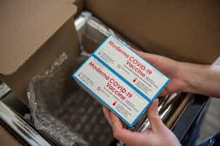 EU regulator approves Moderna coronavirus vaccine amid surge in cases
