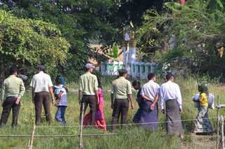 Myanmar police arrest nearly 100 trafficked Rohingya in raid