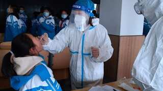 China: UK virus variant found in Beijing, partial lockdown imposed