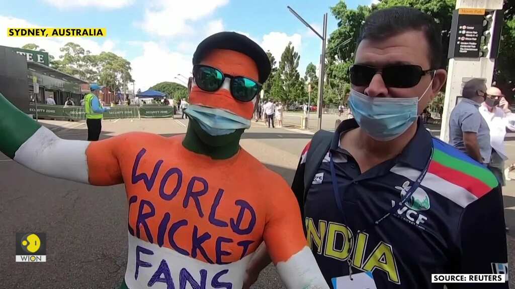 Cricket fans in Sydney mask up in style