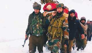 Watch: Indian Army troops carry pregnant woman to hospital in knee-deep snow in Kashmir