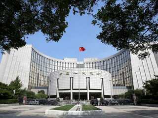 China reduces 1-year policy rate by record amount in stimulus drive