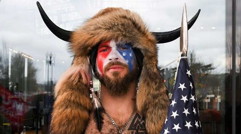 US Capitol invader 'QAnon Shaman' Jake Angeli charged over pro-Trump riots