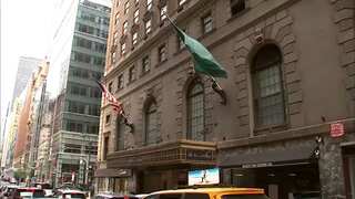 Woman in widely seen hotel confrontation charged in New York