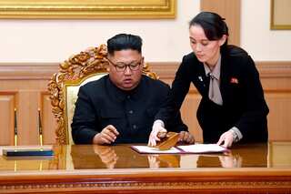 Mixed signals for North Korean leader's sister as Kim seeks to cement power