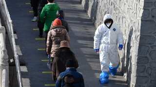 China inducts highest daily coronavirus cases since July