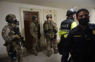 FBI warns armed Trump supporters could hold protests in all 50 states ahead of Biden's inauguration
