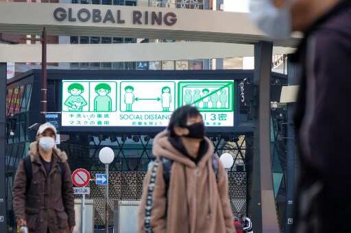 Japan set to expand coroanvirus emergency restrictions amid surge in hospitalisations