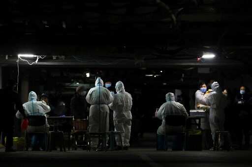 China reports first coronavirus death in eight months as WHO team arrives China reports first coronavirus death in eight months as WHO team arrives