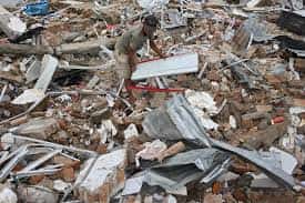 Indonesia hunts for survivors as quake death toll hits 60