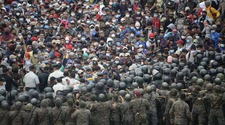 Guatemala police fire tear gas at US-bound migrant caravan