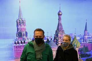Germany's Merkel, US, UK, EU urge Russia to release Putin critic Navalny
