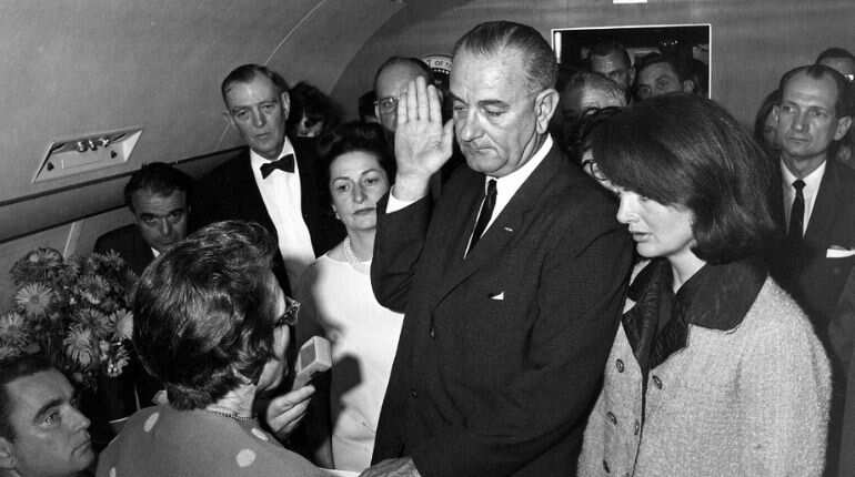 Johnson sworn in on plane