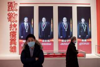 Beijing imposes new restrictions amid surge in COVID-19 cases