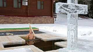 Watch: Russian President Vladimir Putin submerges himself in icy water to mark Orthodox Epiphany