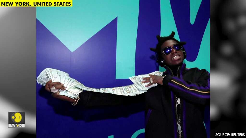 Trump pardons rappers Lil Wayne and Kodak Black