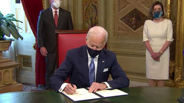 46th U.S. President Joe Biden participates in the signing ceremony at the Capitol