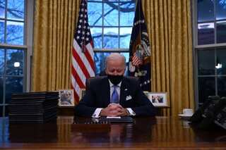 Joe Biden signs raft of orders, rolls back Trump policies on coronavirus, immigration and more