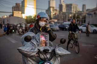 China to test Lunar New Year travellers amid partial lockdown in Beijing