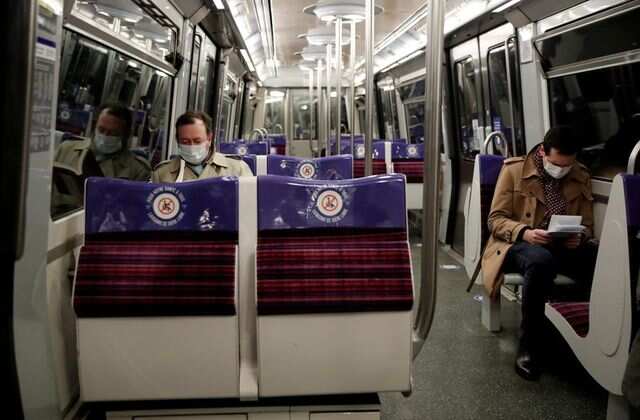 Don't talk on the subway, say French doctors, to limit COVID-19 spread