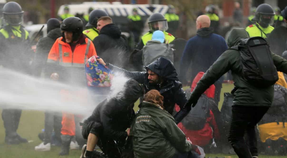 Dutch police clash with anti-lockdown rioters in two cities