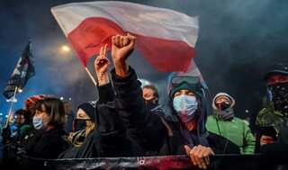 Poland abortion law: Protesters take to streets again as near-total ban comes into force