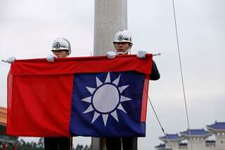 As Biden's emissaries go to Taiwan, China terms exercises 'combat drills'