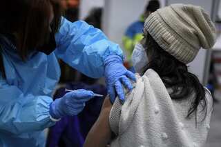 EU adopts coronavirus vaccine export control scheme; approves AstraZeneca vaccine