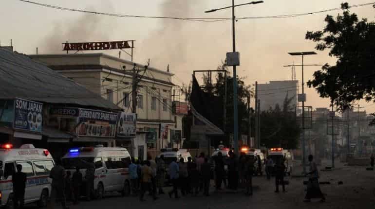 Blast and gunfire rock Somalia's capital; Shebab jihadist group claims responsibility Blast and gunfire rock Somalia's capital; Shebab jihadist group claims responsibility