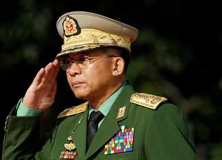 After pressuring telecom firms, Myanmar's junta bans executives from leaving