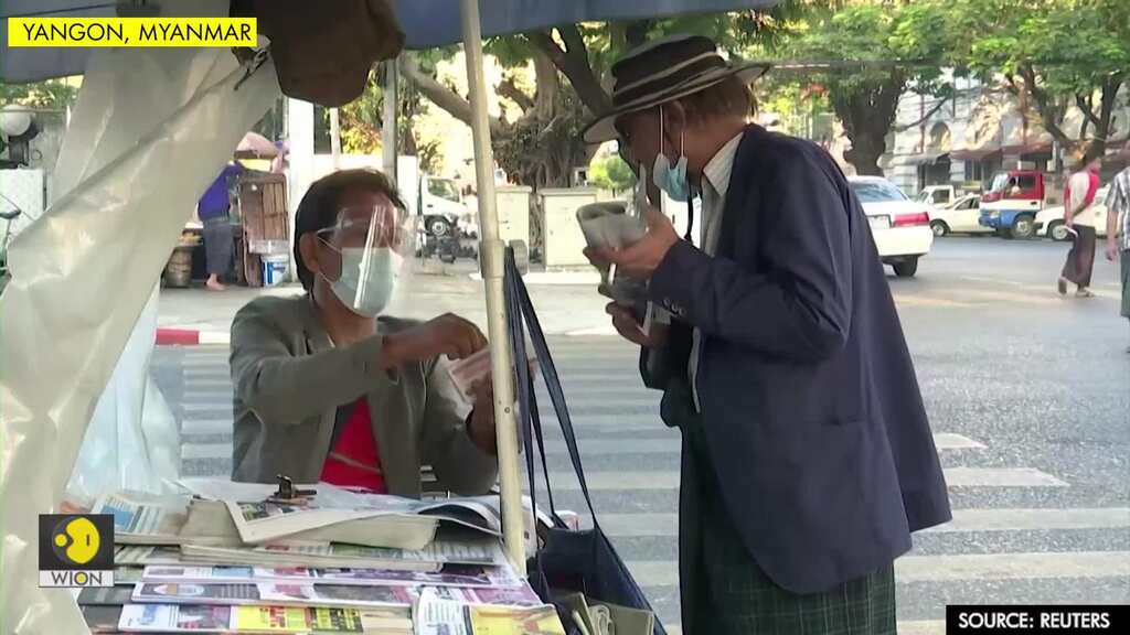 Yangon newspaper vendor fears low sales with people avoiding news of military leaders