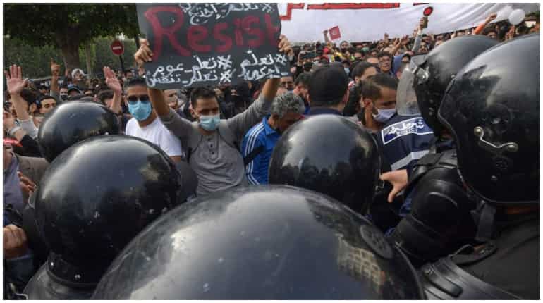 Tunisia: Protesters clash with police on activist's death anniversary Tunisia: Protesters clash with police on activist's death anniversary