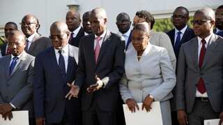 Haiti government denounces plot to oust president, arrests over 20