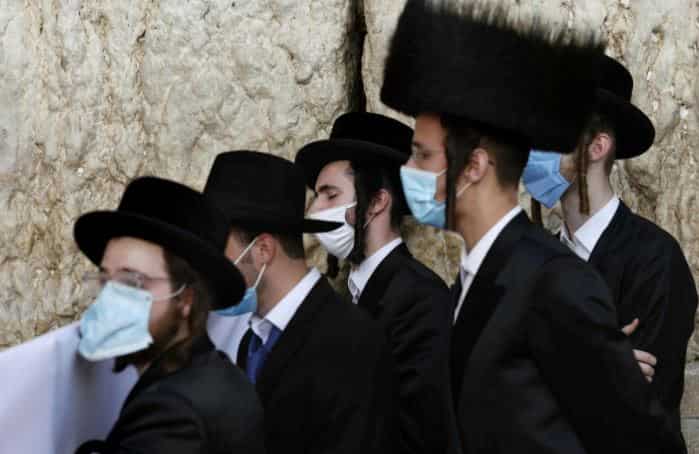 Hundreds of hardline Haredim protest coronavirus enforcement in Jerusalem