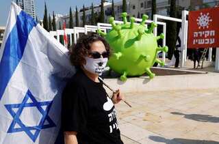 Israel adopts law allowing identities of unvaccinated to be shared