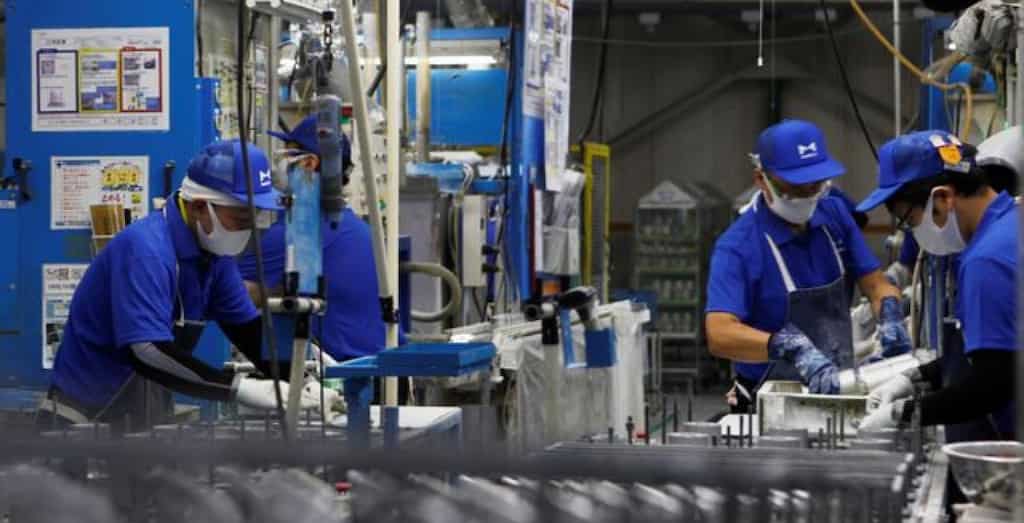 Japan's factory mood turns positive for first time since 2019