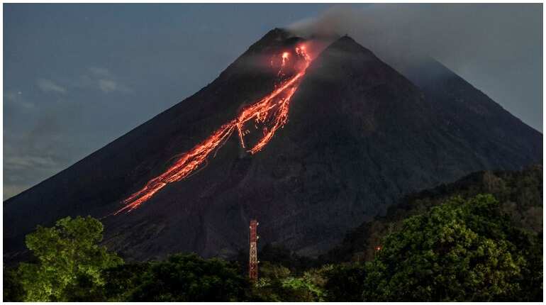 Indonesia volcano erupts, blankets villages in ash