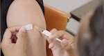 After snap lockdown, New Zealand begins vaccine programme