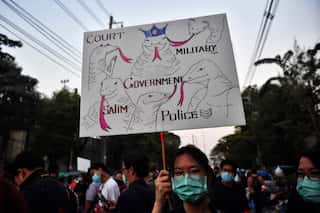 Hundreds protest in Thailand outside parliament after Prime Minister Prayuth Chan-ocha survives vote