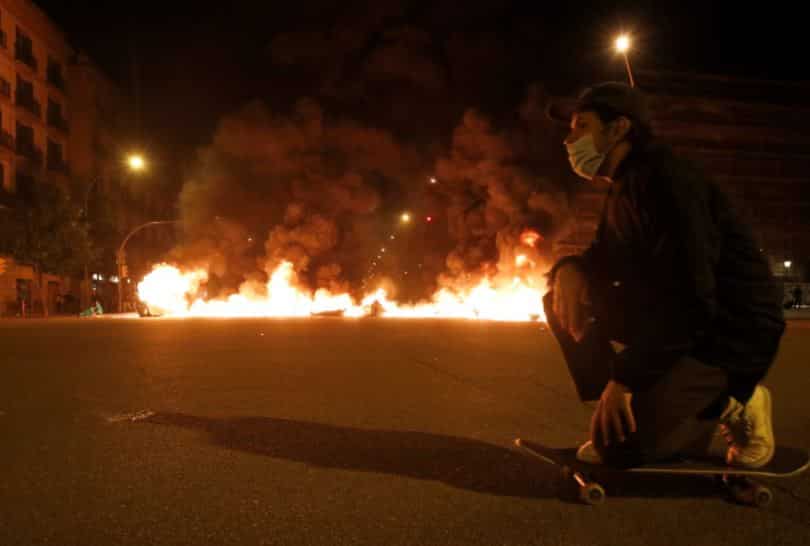 Protesters throw stones at police and neighbours over jailed Spanish rapper