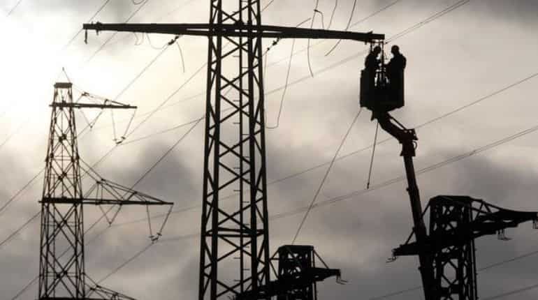 Chinese man climbs electricity pole; causes power outage