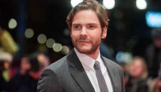 Daniel Bruehl skewers superhero stardom in gentrifying Berlin