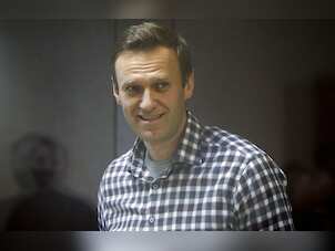 Kremlin critic Navalny says he risks solitary confinement over infractions