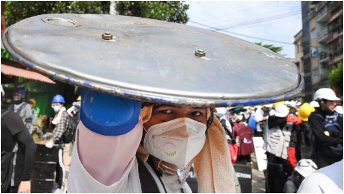 Protesters continue to defy military