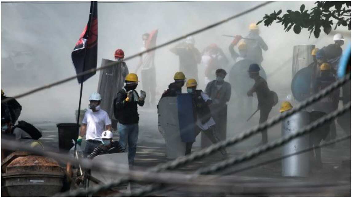 Protesters use tactics to stall military