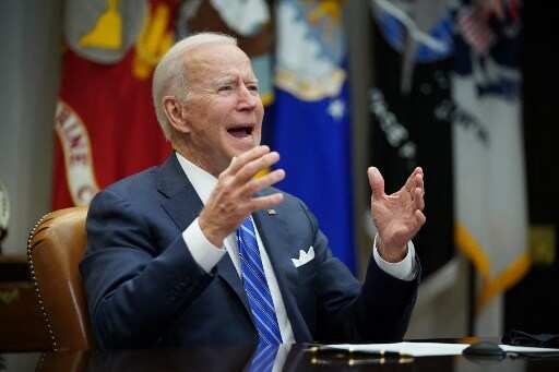 Biden backs Japan PM on holding 'safe and secure' Olympic Games